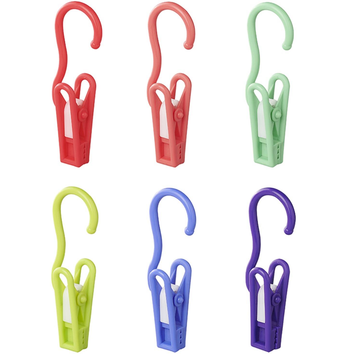 Eine Sammlung von sechs bunten Plastik-Haken mit Klammern in Rot, Rosa, Grün, Gelb, Blau und Lila, angeordnet in zwei Reihen.