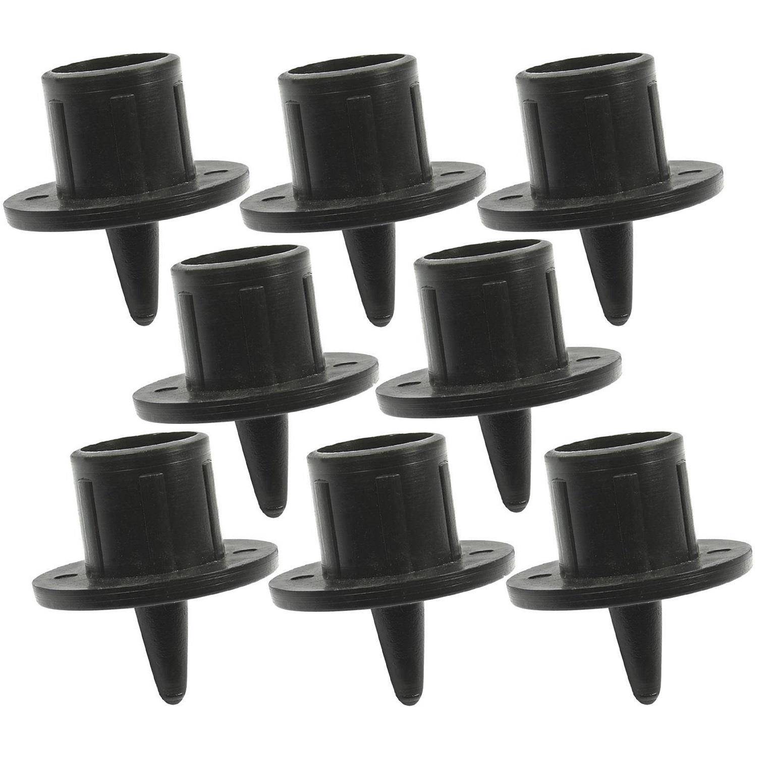 Schwarze Gummikappen mit konischer Form, in zwei versetzten Reihen mit je vier Stück angeordnet.