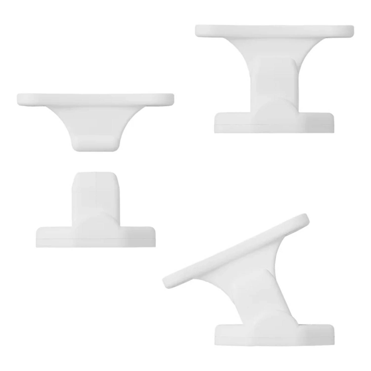 Drei weiße Kunststoff-Regalhalterungen in verschiedenen Ausrichtungen vor einem weißen Hintergrund.