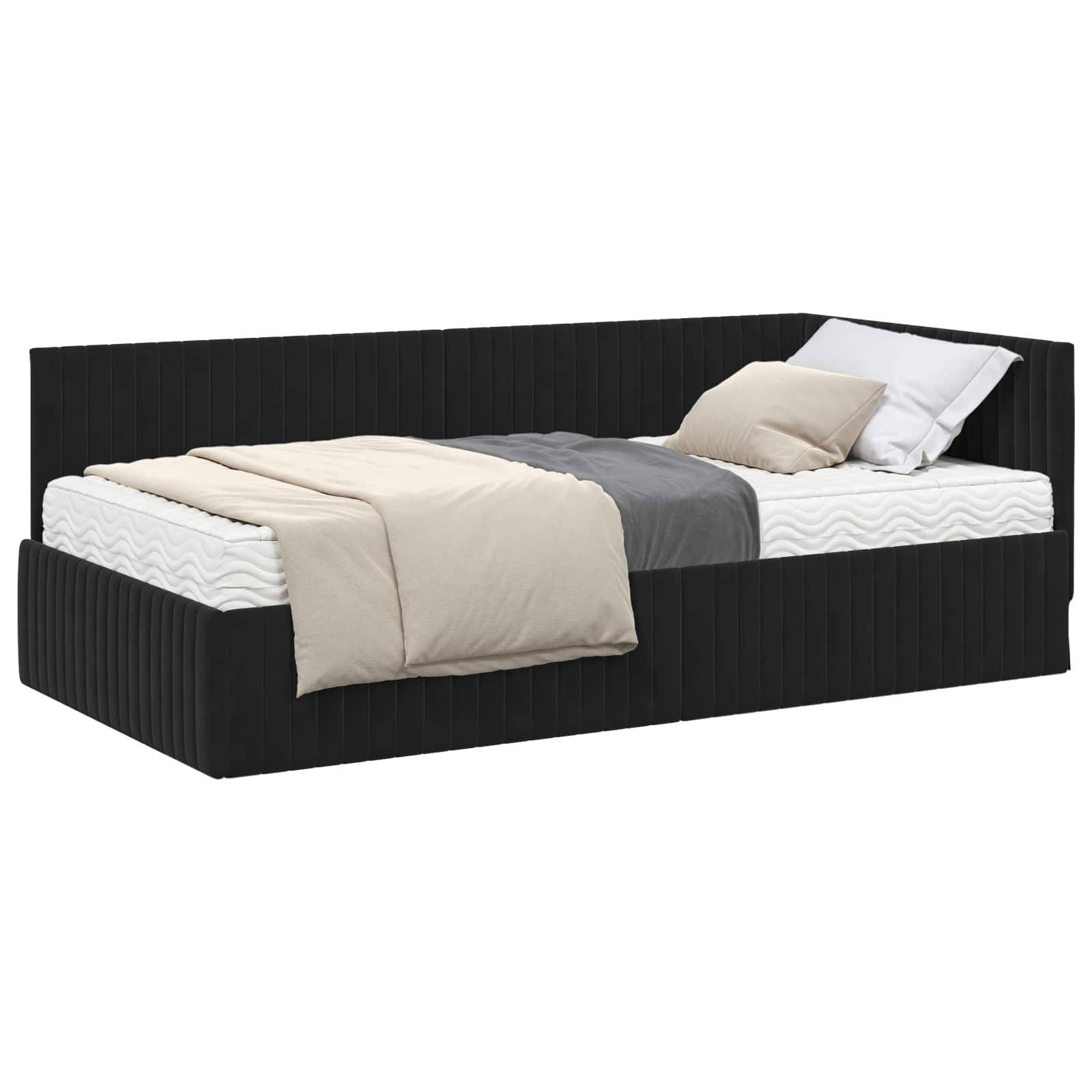 Ein schwarzes Tagesbett mit einer weißen Matratze, einer beigen Decke, grauen und weißen Kissen, geeignet für ein modernes Schlafzimmer oder Gästezimmer.