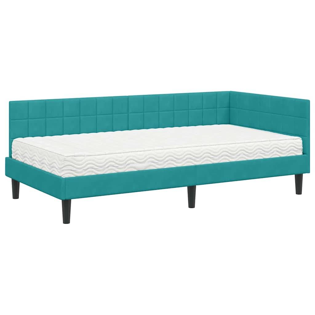 Türkisfarbenes Polster-Tagesbett mit schwarzen Beinen und weißer Matratze, das ein modernes Design präsentiert, das sich für ein Wohnzimmer oder Gästezimmer eignet.