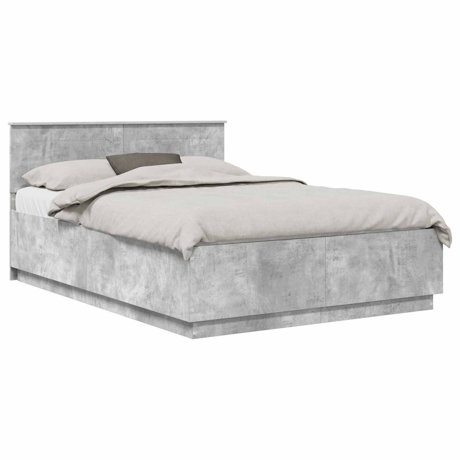 Ein graues Bett mit Kopfteil und Bettwäsche, einschließlich Kissen und Steppdecke, vor einem einfachen weißen Hintergrund angezeigt.