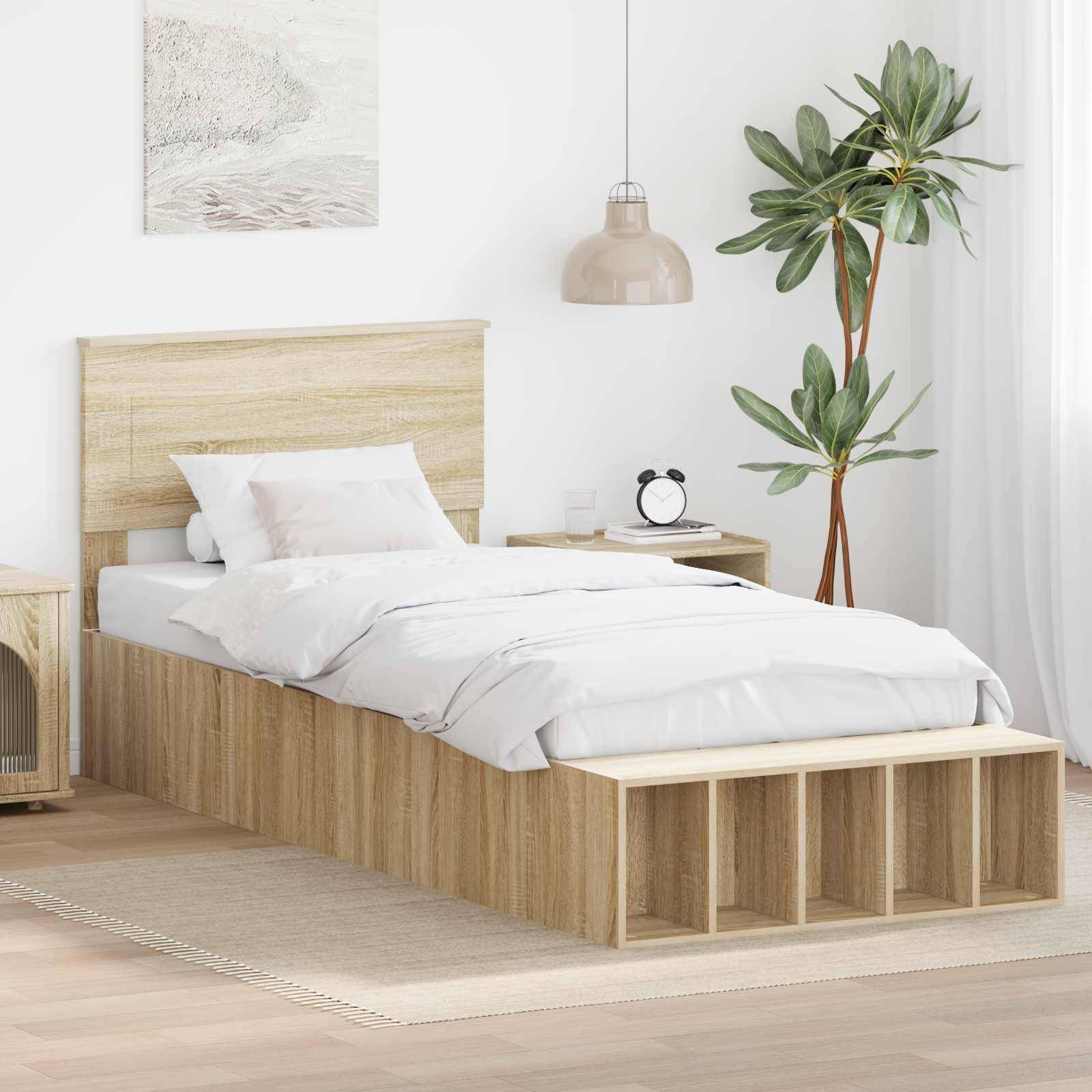 Ein minimalistisches Schlafzimmer mit einem Holzbettgestell, weißer Bettwäsche, einem kleinen Nachttisch, einer Pflanze und einem Gemälde an einer beigen Wand.