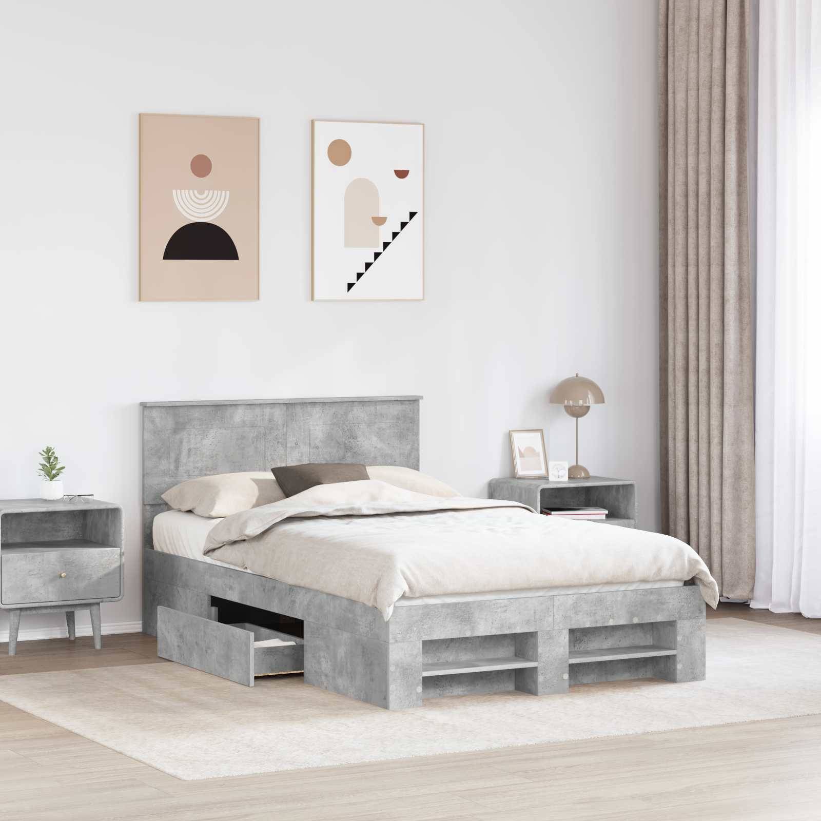 Ein modernes Schlafzimmer mit einem grauen Bett mit Staurageschubladen, einem Nachttisch mit einer Pflanze und zwei abstrakten Kunstwerken an der weißen Wand.