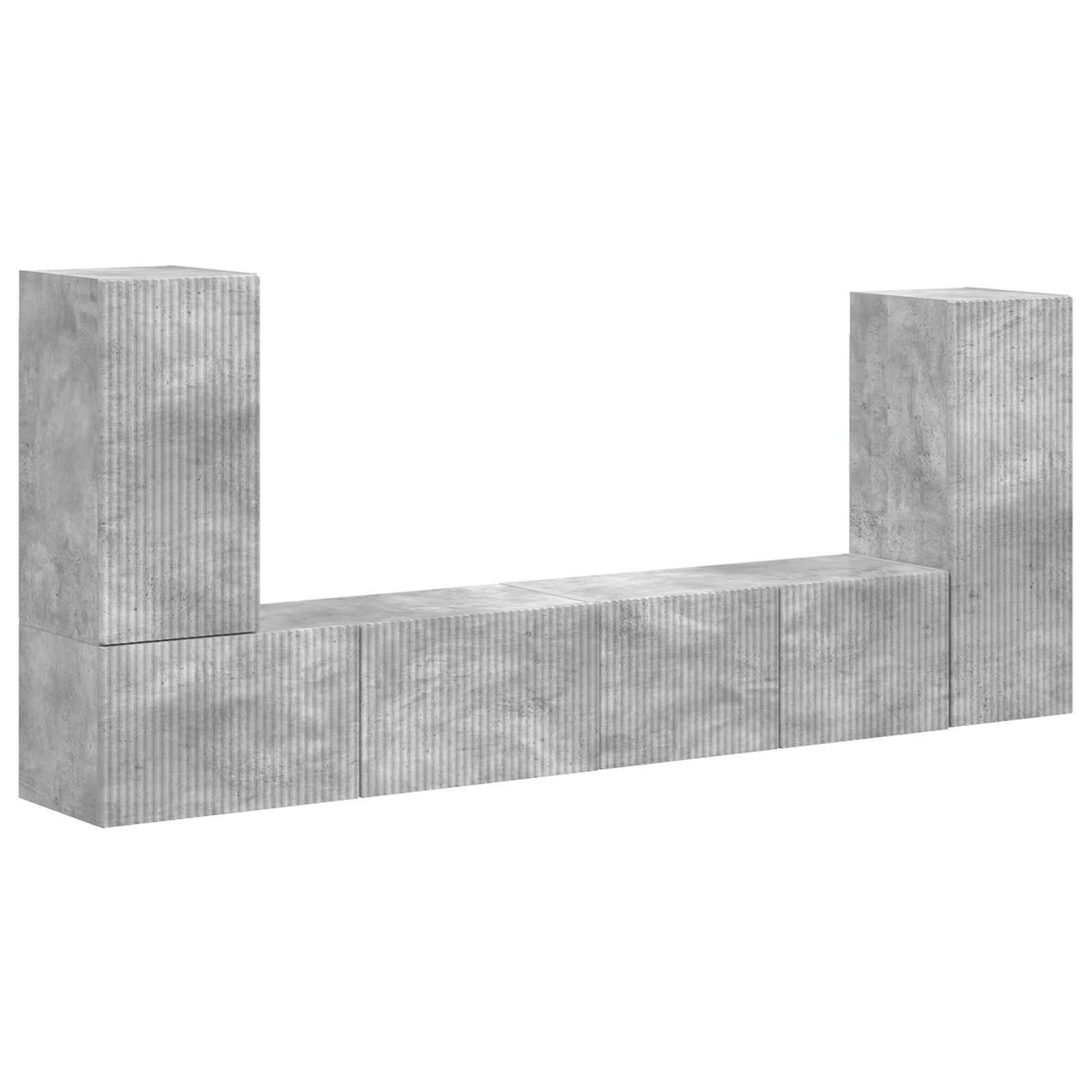Betonblockformation in Form eines großen ‚U', gebildet durch vertikal gestapelte und ausgerichtete strukturierte Betonblöcke.