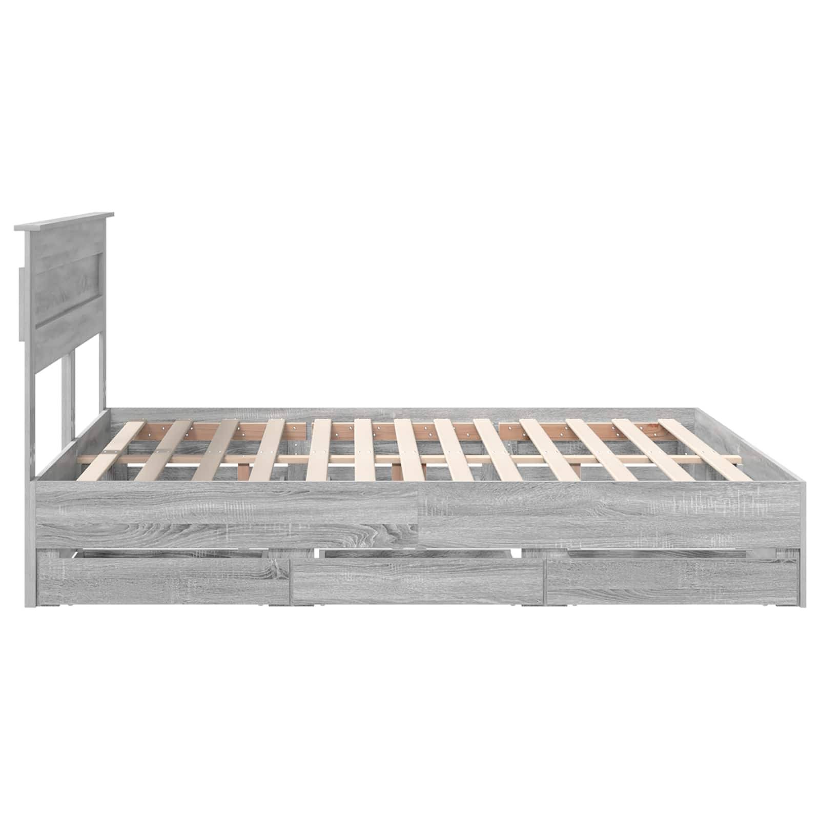 Ein Holzbettgestell in grauer Ausführung mit Lattenrost, Kopfteil und Unterbett-Schubladen, von der Seite betrachtet.