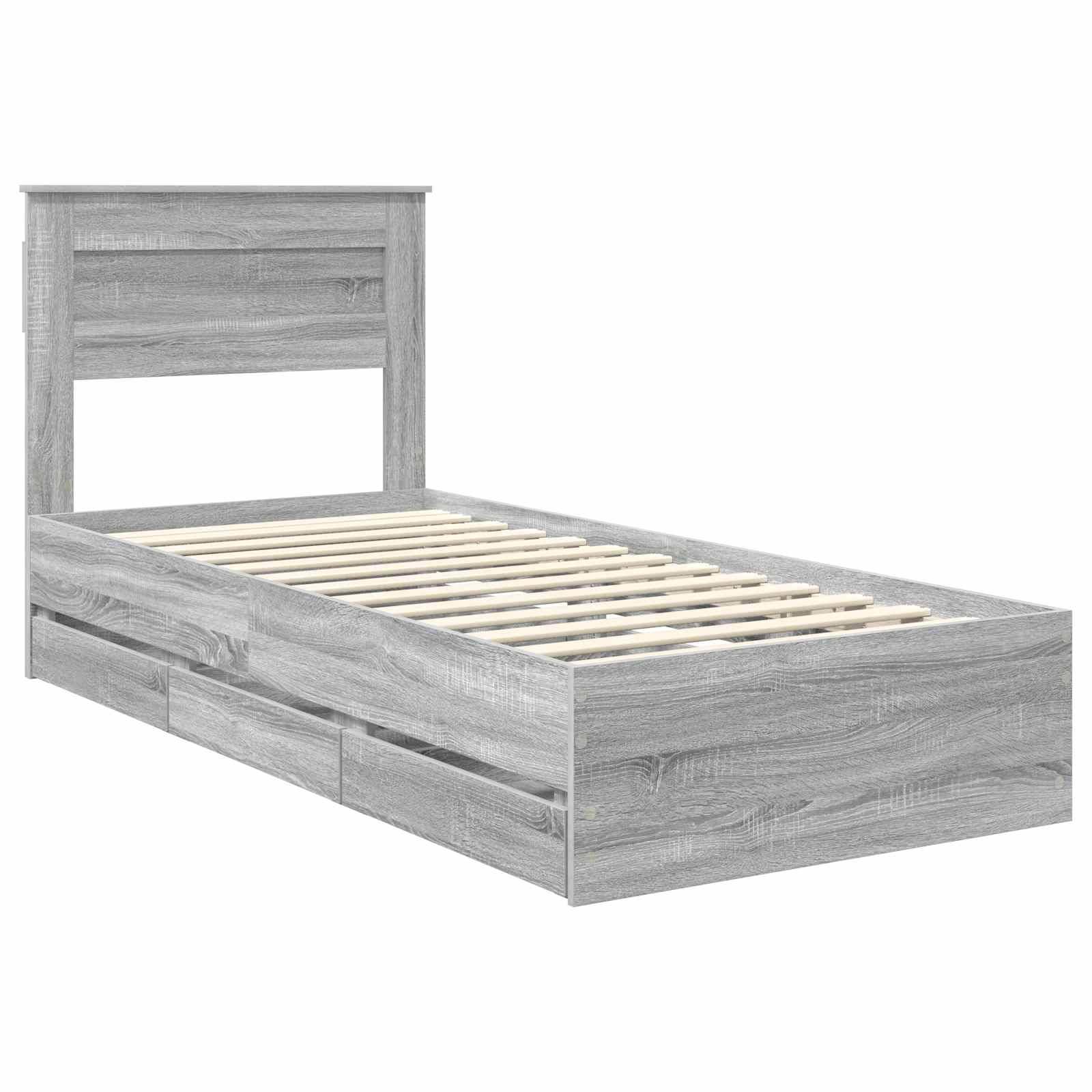 Ein grauer Holz-Doppelbettrahmen mit einem Kopfteil, ausgestattet mit drei Unterbett-Schubladen an einer Seite.