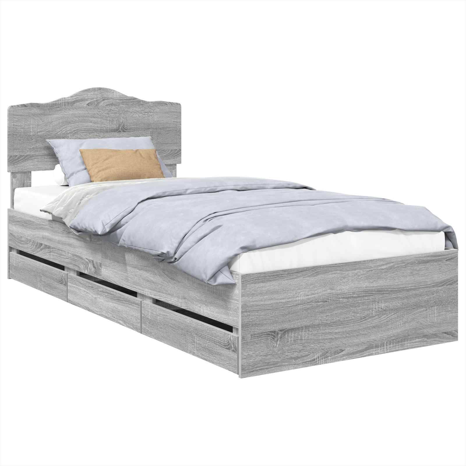 Graues Holzbett mit Kopfteil, hellblaue Bettwäsche und braunem Zierkissen. Minimalistisches Design mit Staurageschubladen darunter.
