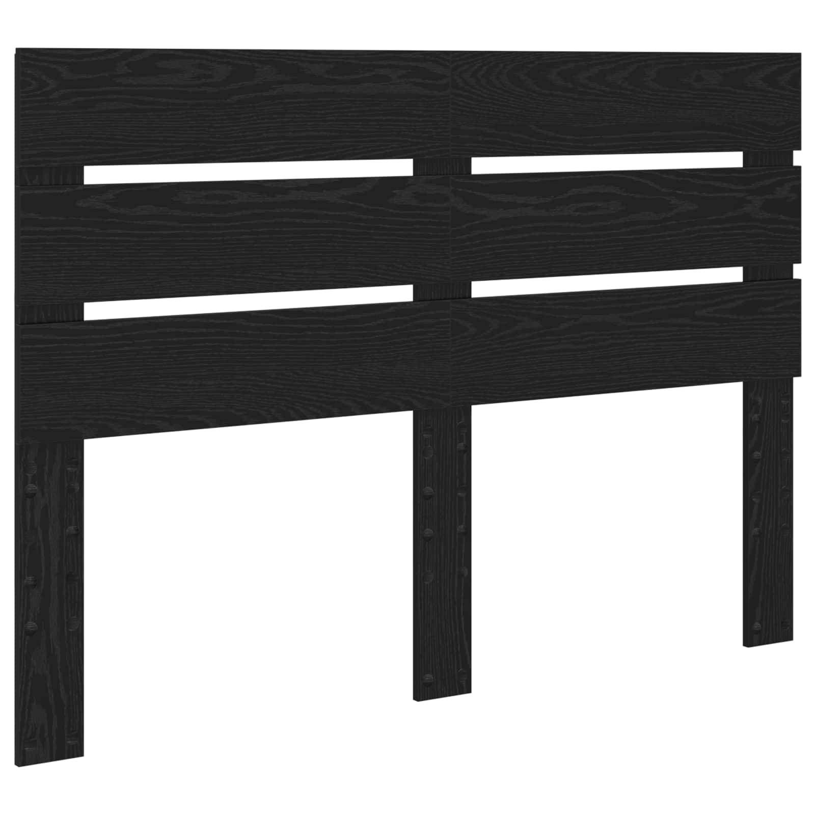 Ein schwarzes Holzkopfteil mit horizontalem Lamellenentwurf und Zwischenräumen für ein modernes Aussehen.