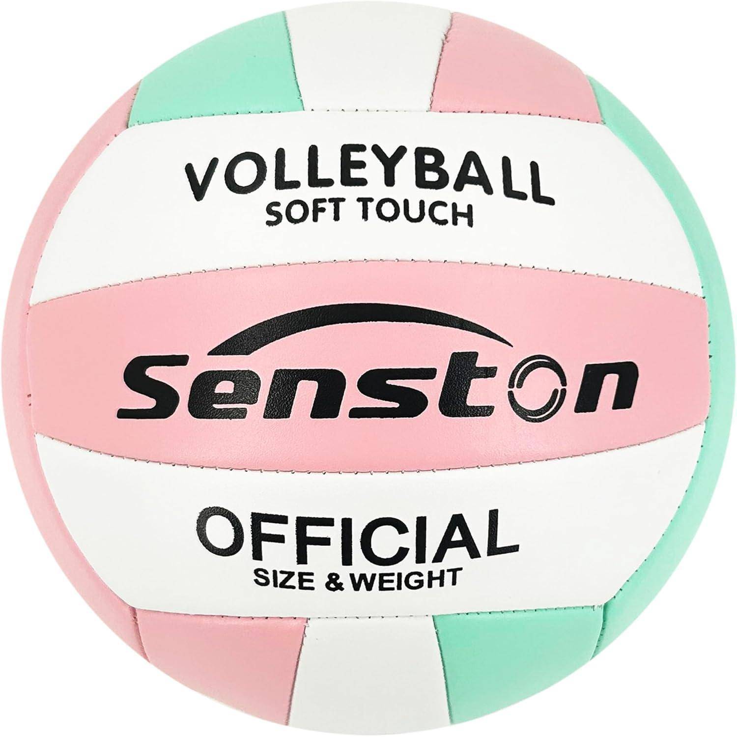 Ein Volleyball mit einem rosa, grünen und weißen Design. Der Text 'VOLLEYBALL SOFT TOUCH', 'Senston' und 'OFFICIAL SIZE & WEIGHT' ist darauf gedruckt.