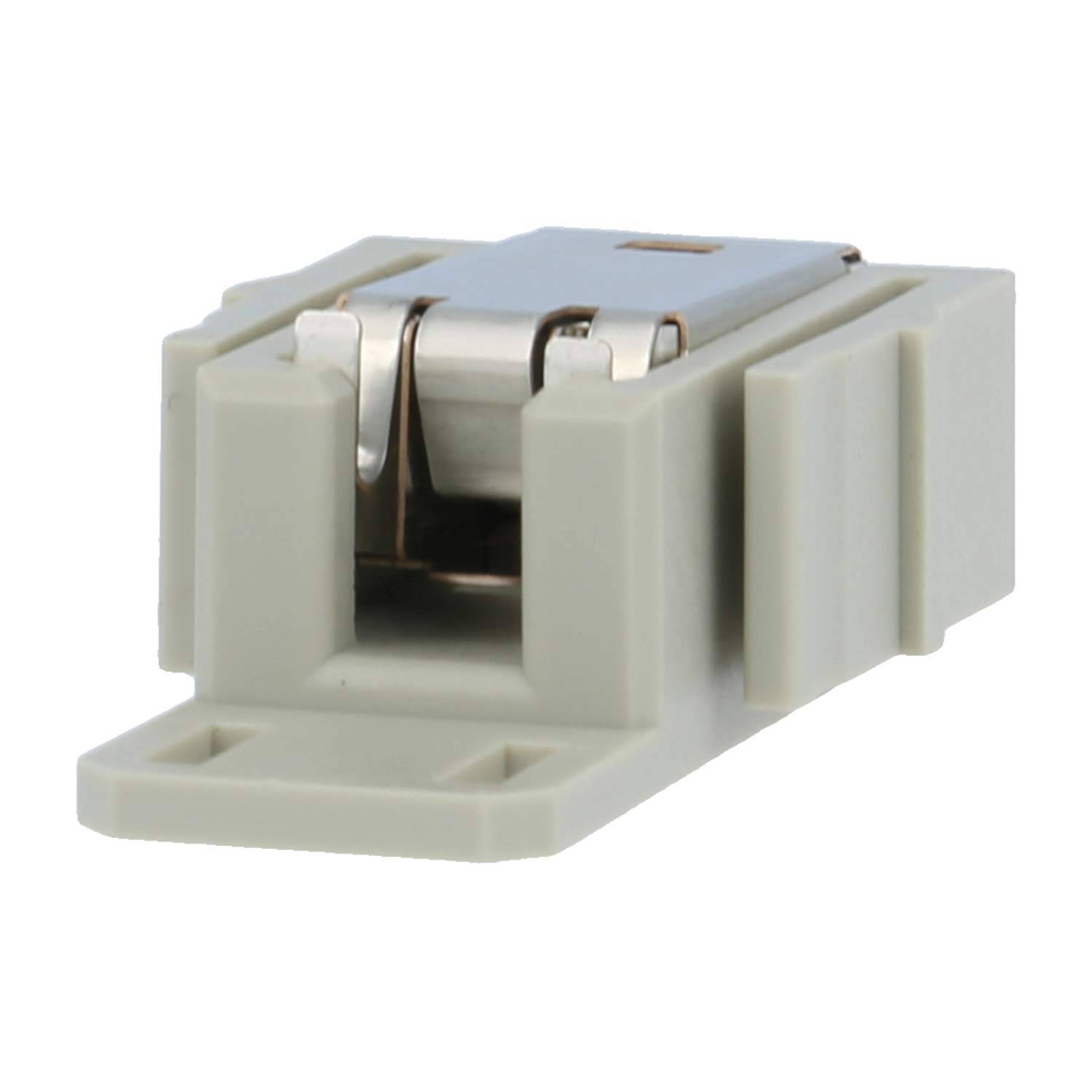Ein beiger USB-Stecker, auf einer Basis montiert, zeigt die Portöffnung mit Metallkontakten im Inneren.