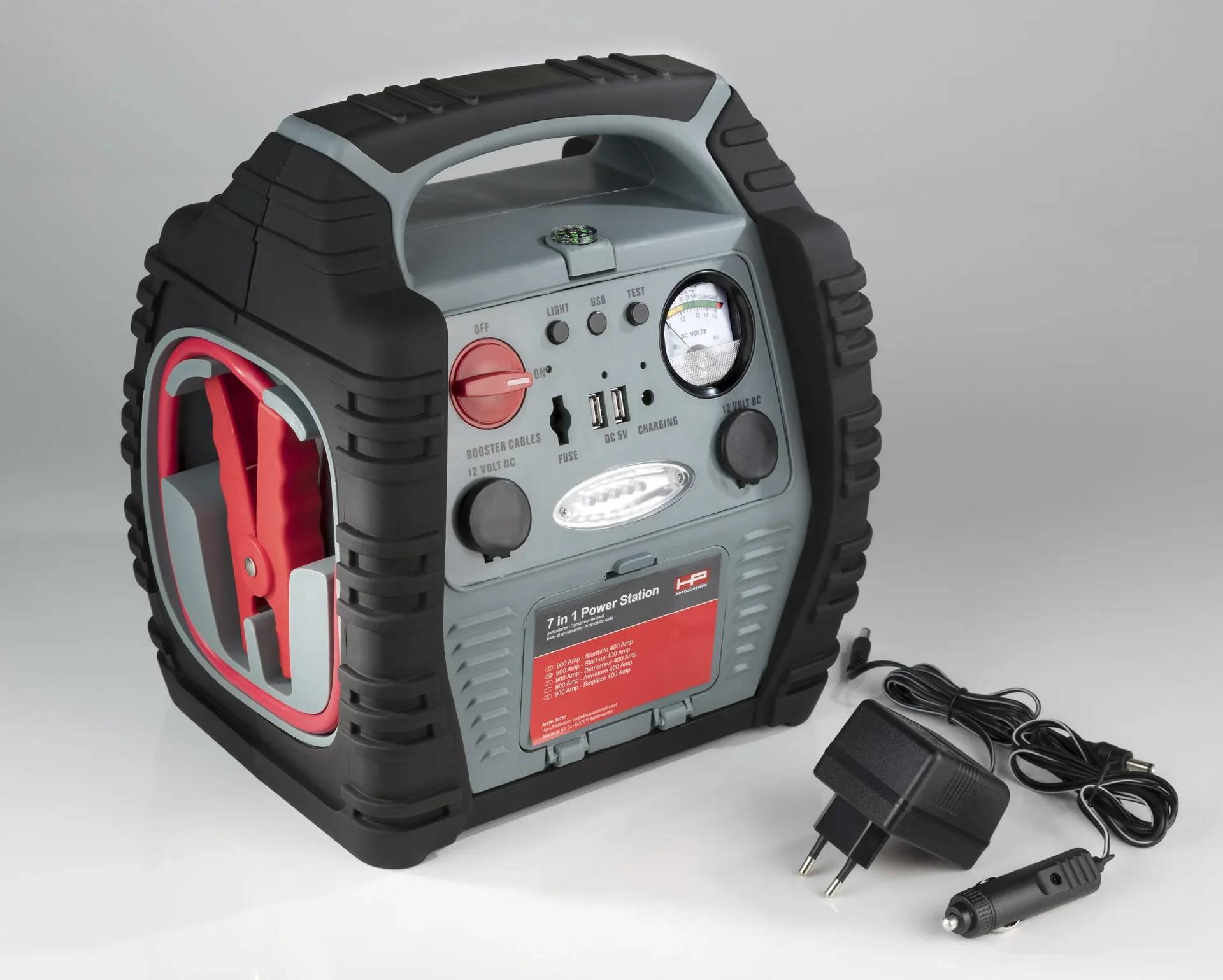 Eine mobile Stromversorgungseinheit mit integrierter Beleuchtung, Luftkompressor-Manometer und Starthilfe-Kabeln. Enthält USB-Ladeanschlüsse und Wandadapter.