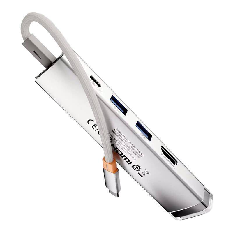 Ein schlanker silberner USB-C-Hub mit mehreren Anschlüssen, darunter USB und HDMI.