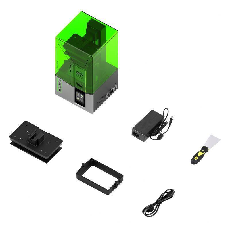 3D-Druckerkomponenten: grüngetönte Abdeckung, Druckerbasis, Netzteil, USB-Kabel, Schabwerkzeug. Wesentlich für Montage und Betrieb.