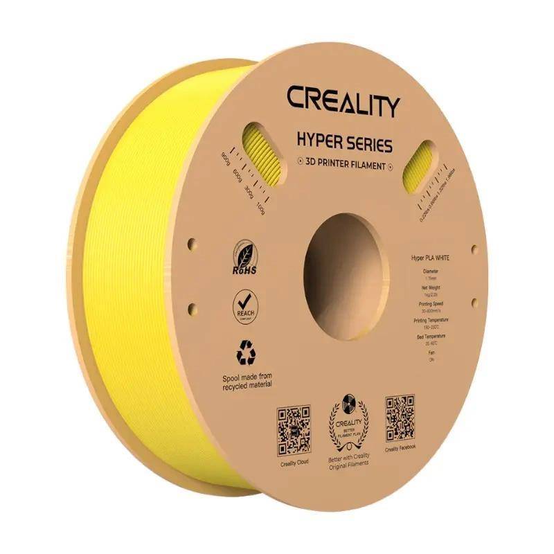 Eine Spule CREALITY Hyper Series gelbes 3D-Druckerfilament. Die Pappspule zeigt Produktinformationen und Nachhaltigkeitssymbole.