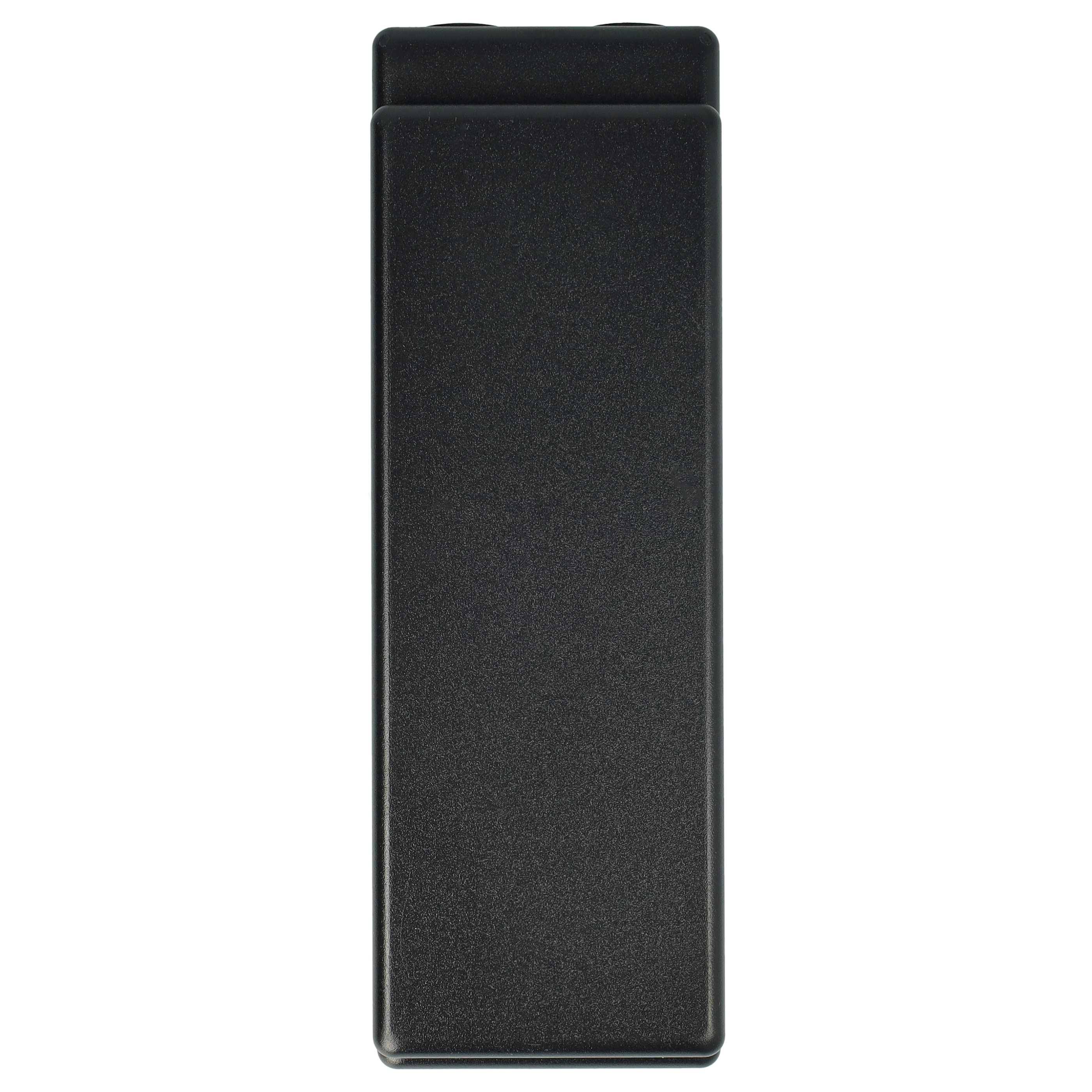 Ein schwarzes rechteckiges Objekt, höchstwahrscheinlich ein elektronisches Gerät oder Bauteil, von oben betrachtet vor einem weißen Hintergrund.