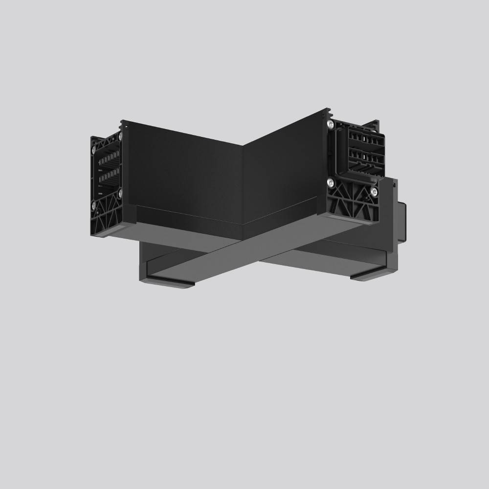 Ein schwarzes, L-förmiges modulares Objekt mit komplexen Details, das vor einem hellgrauen Hintergrund schwebt.