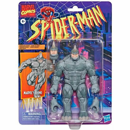 Die Abbildung zeigt eine Spielzeugverpackung für 'Marvels Rhino' aus Spider-Man, die eine graue Actionfigur sowie einen zusätzlichen Kopf, Arme und Zubehör zeigt.