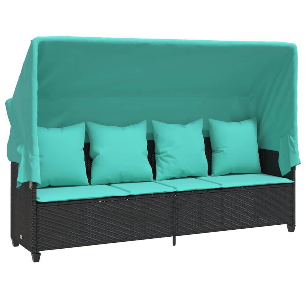 Outdoor-Sofa aus schwarzem Geflecht mit petrolblauen Kissen und Baldachin.