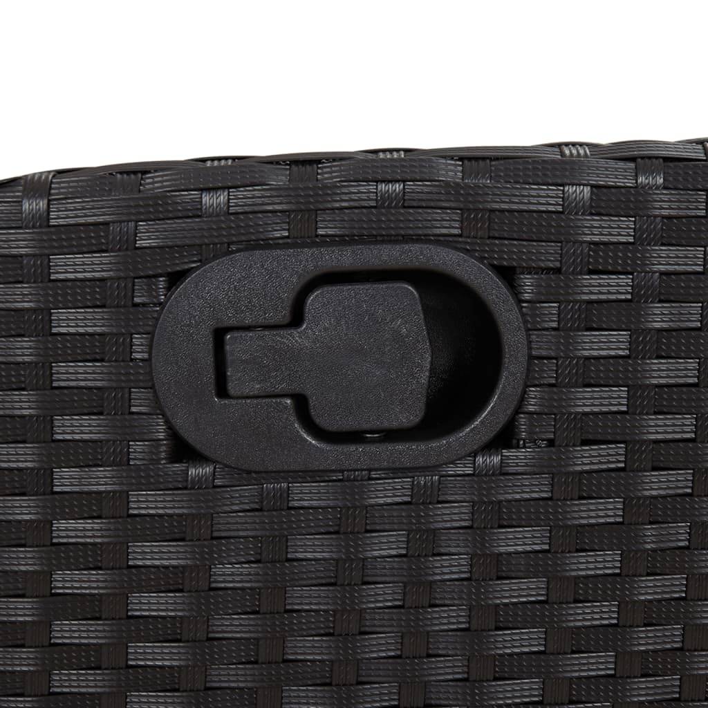 Eine Nahaufnahme einer schwarzen gewebten Textur mit einem schwarzen, oval geformten Verschluss in der Mitte.