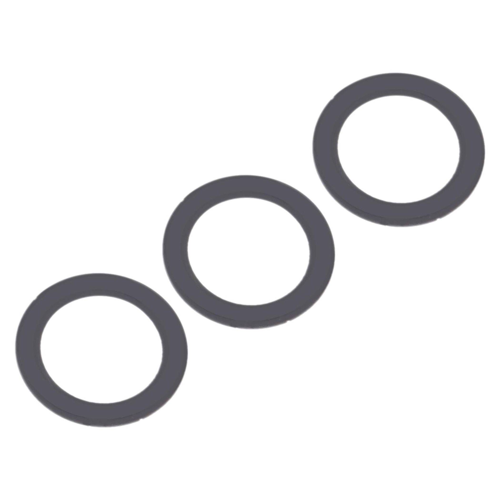 Drei graue kreisförmige Gummidichtungen, die diagonal auf einem weißen Hintergrund angeordnet sind.