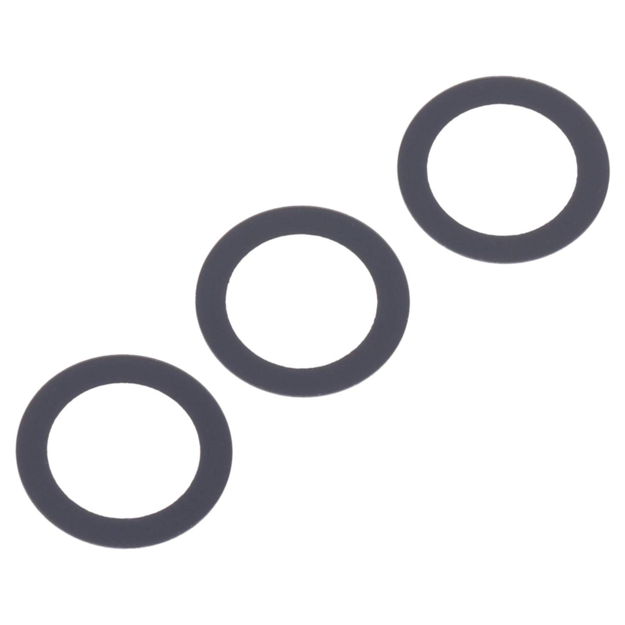 Drei schwarze Gummidichtungen diagonal auf weißem Hintergrund ausgerichtet.
