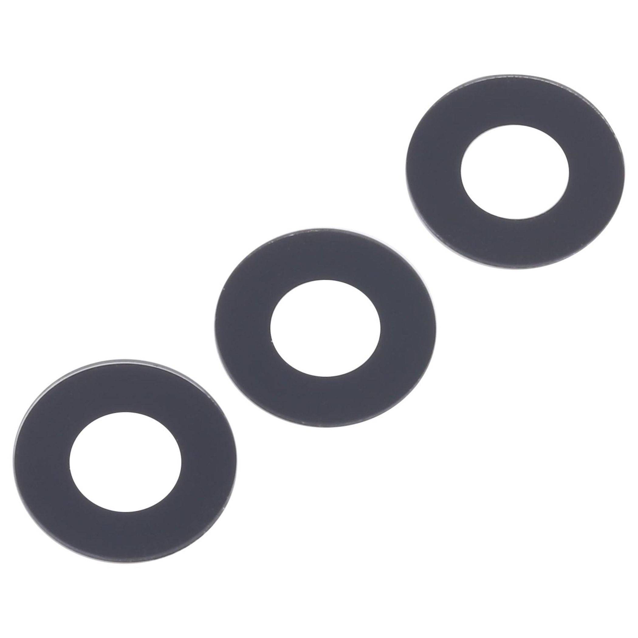 Drei schwarze, kreisförmige Unterlegscheiben, diagonal auf einem weißen Hintergrund angeordnet.