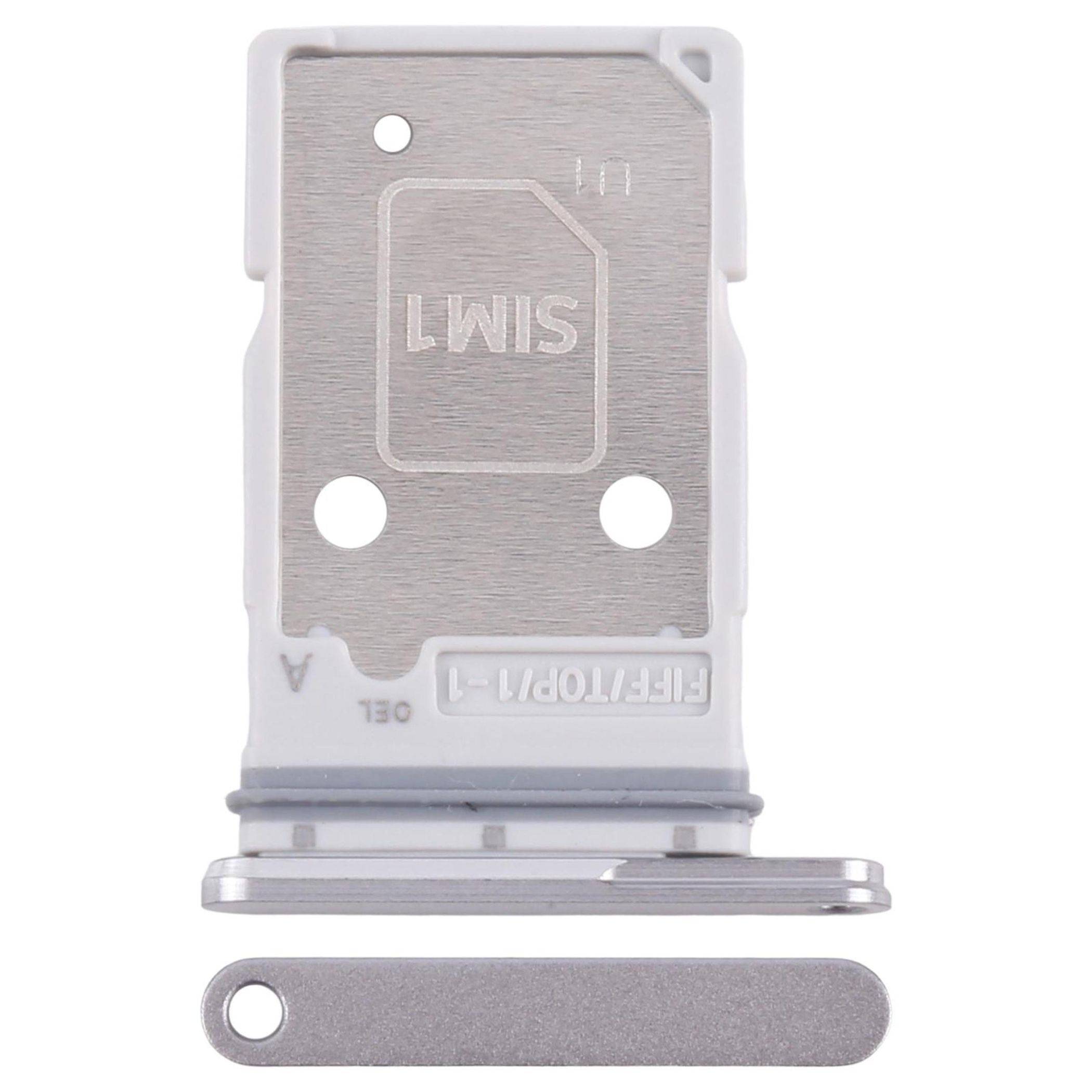 Das Bild zeigt einen metallischen SIM-Karten-/Ausstoßwerkzeughalter für ein elektronisches Gerät, einschließlich eines einfachen Ausstoßstifts, der parallel dazu liegt.
