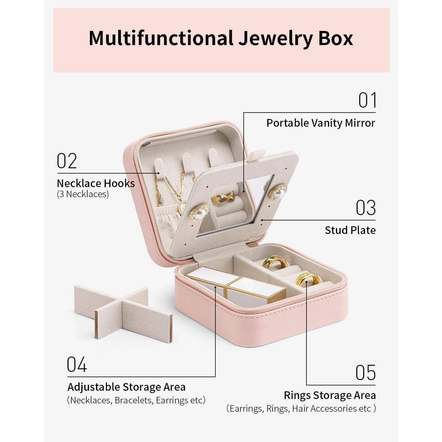 Multifunktionale Schmuckbox in Rosa. Offenes Design mit tragbarem Kosmetikspiegel, Halskettenhaken, Ohrsteckerablage und Aufbewahrungsbereichen für Ringe und Accessoires.