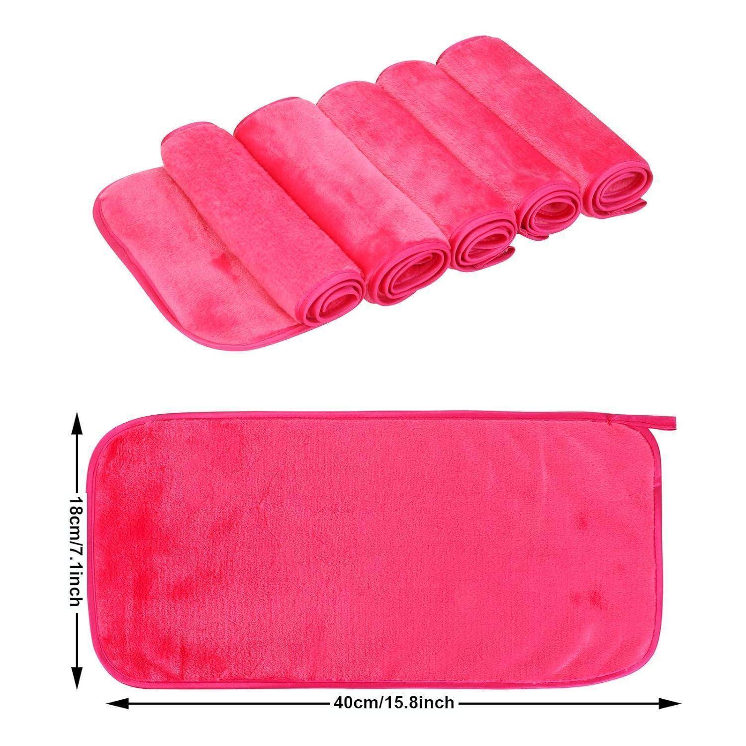 Fünf gerollte rosa Waschlappen sind neben einem entfalteten Waschlappen zu sehen, dessen Abmessungen mit 40 cm x 18 cm beschriftet sind.