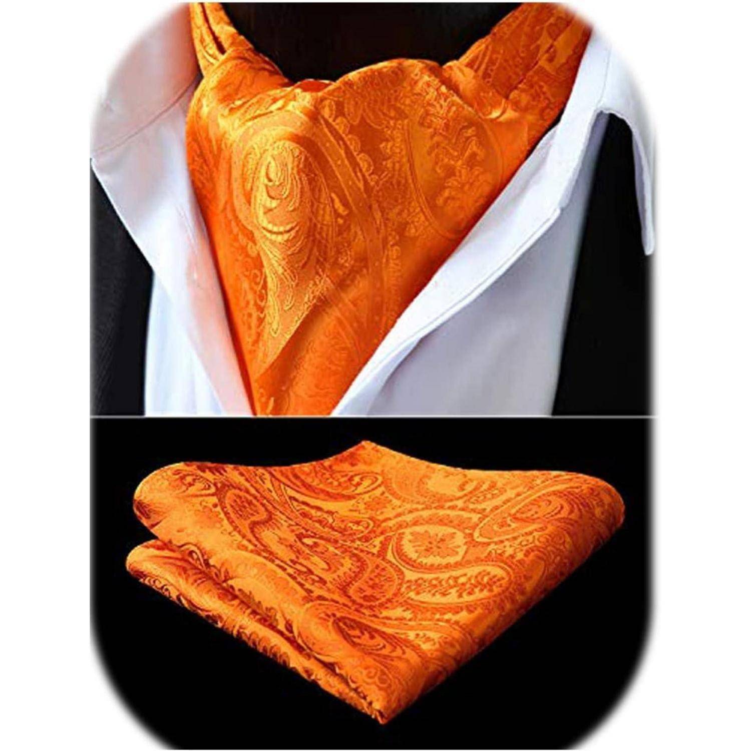 Orange paisley Seidenkrawatte und Einstecktuch-Set auf einem weißen Hemd unter einem schwarzen Anzugsakko, die einen formellen Kleidungsstil betonen.