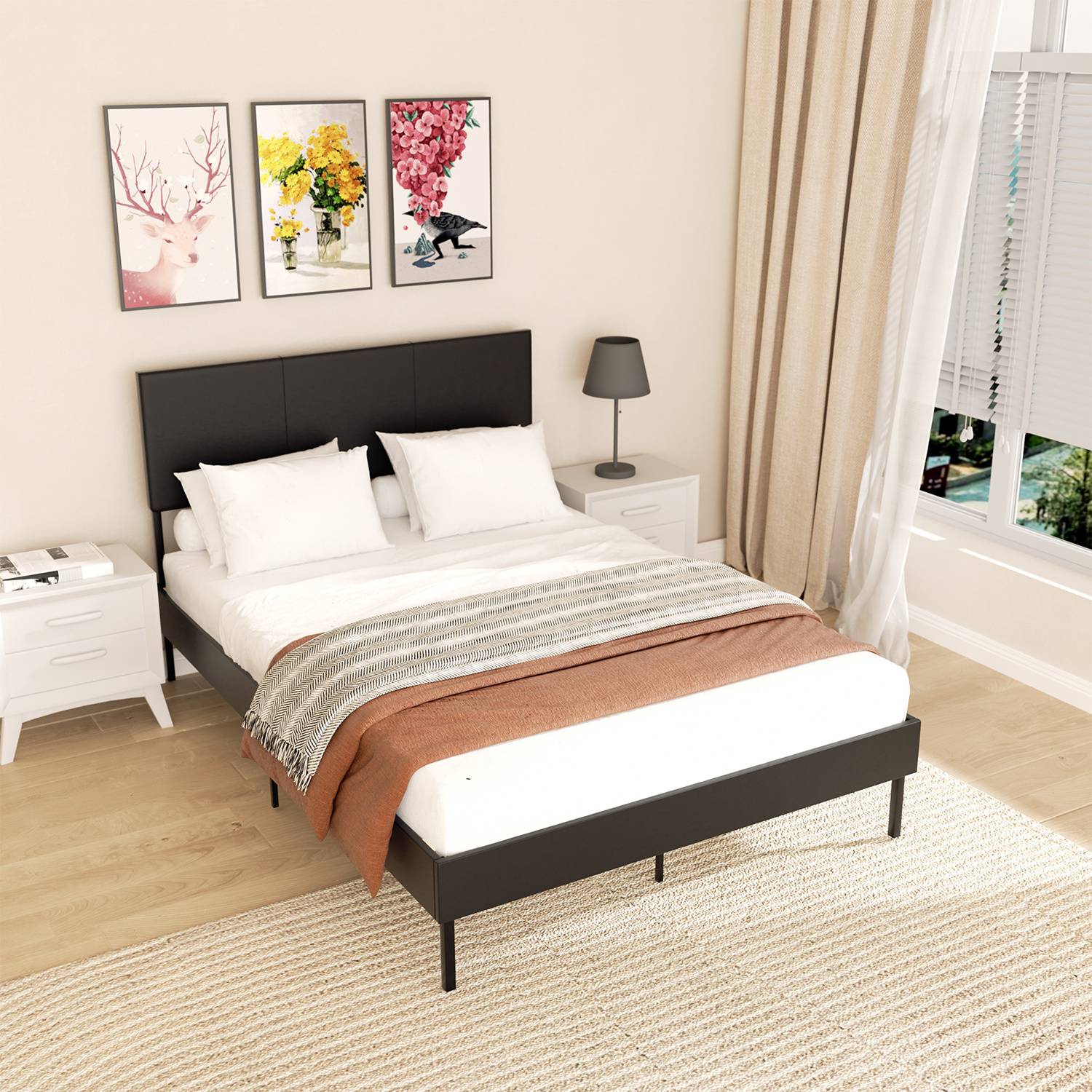 Ein modernes Schlafzimmer mit einem ordentlich gemachten Bett mit weißer und orangefarbener Bettwäsche, zwei Nachttischen mit Lampen und drei gerahmten Kunstwerken über dem Bett.