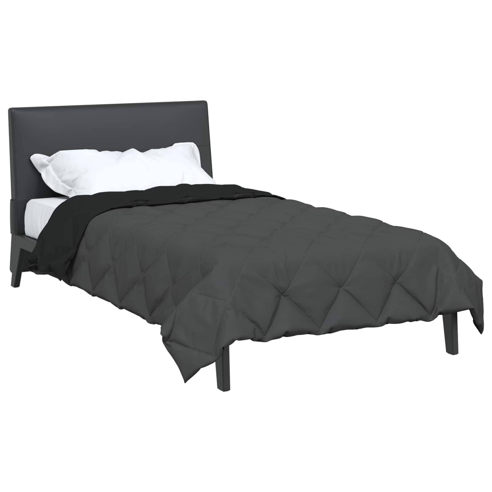 Ein schwarzes gepolstertes Bett mit weißen Kissen und einer schwarzen Steppdecke, von der Seite gesehen, vor einem einfarbigen Hintergrund.