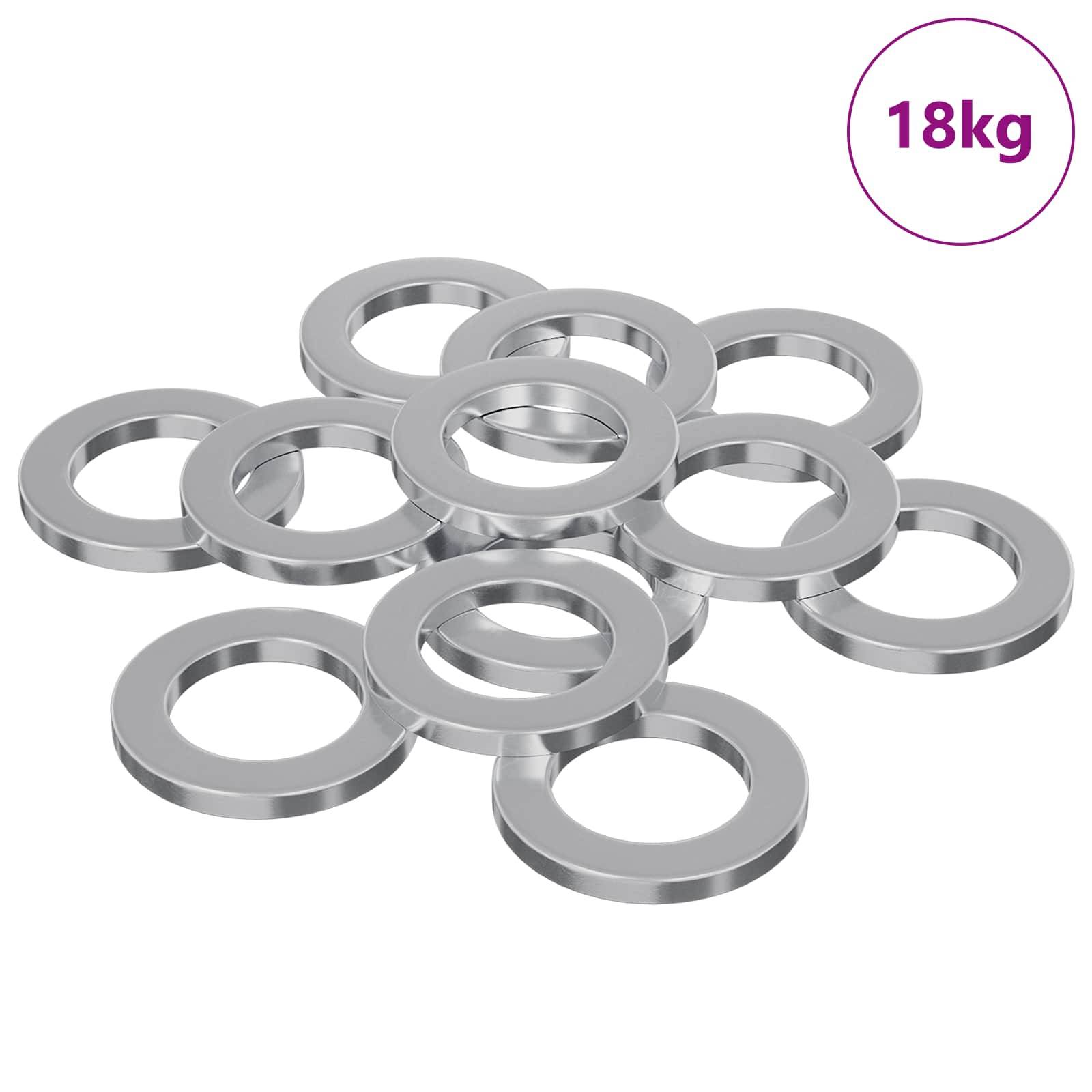 Ein Cluster von 12 glänzenden Metallunterlegscheiben, jede mit einer glatten, kreisförmigen Form, zufällig gestapelt. Eine Beschriftung zeigt '18kg' in der oberen rechten Ecke.