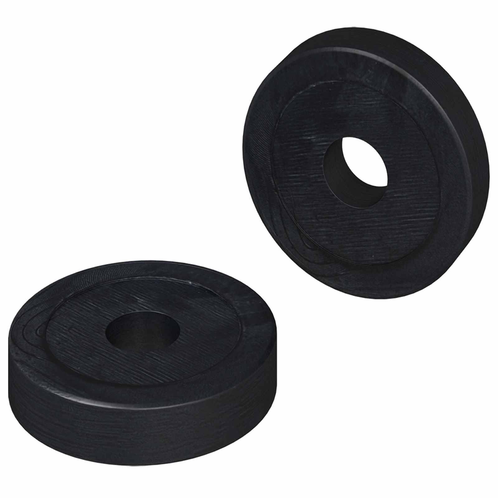 Zwei runde schwarze Magnete mit zentralen Löchern, die in der Luft vor einem einfarbigen Hintergrund positioniert sind, deuten auf eine Verwendung beim Basteln oder für Aufbewahrungslösungen hin.