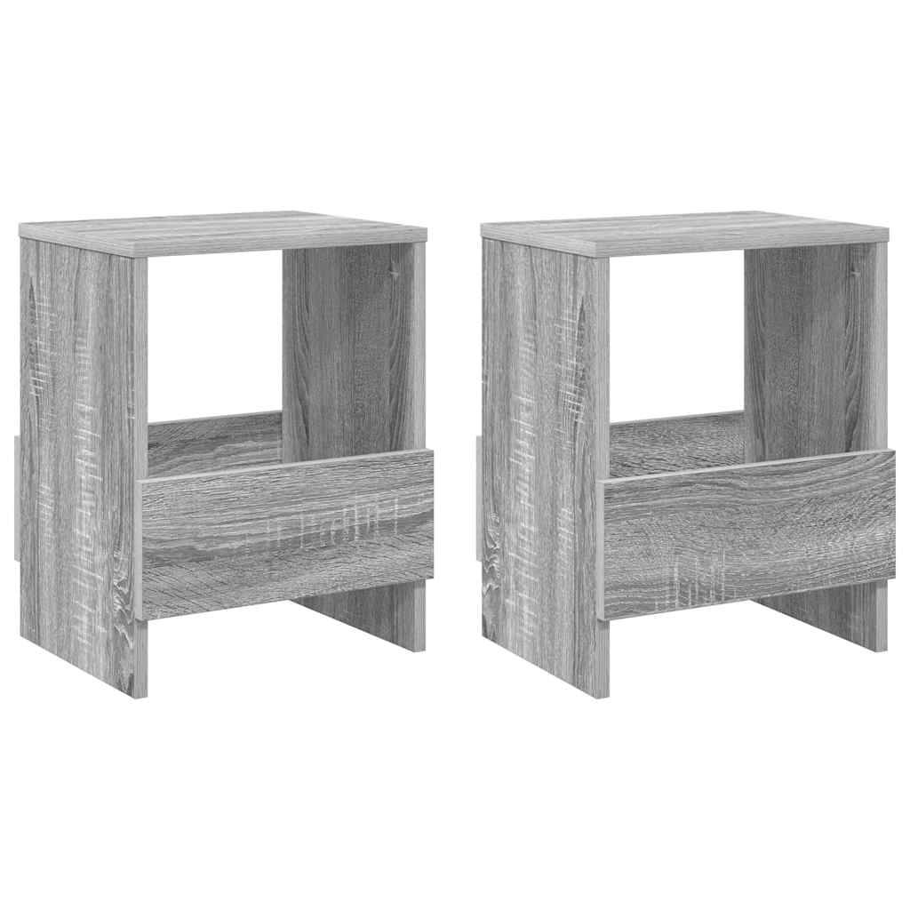 Zwei graue Holznachttische mit einem unteren offenen Regal und einer Schublade, designed im schlichten, modernen Stil.