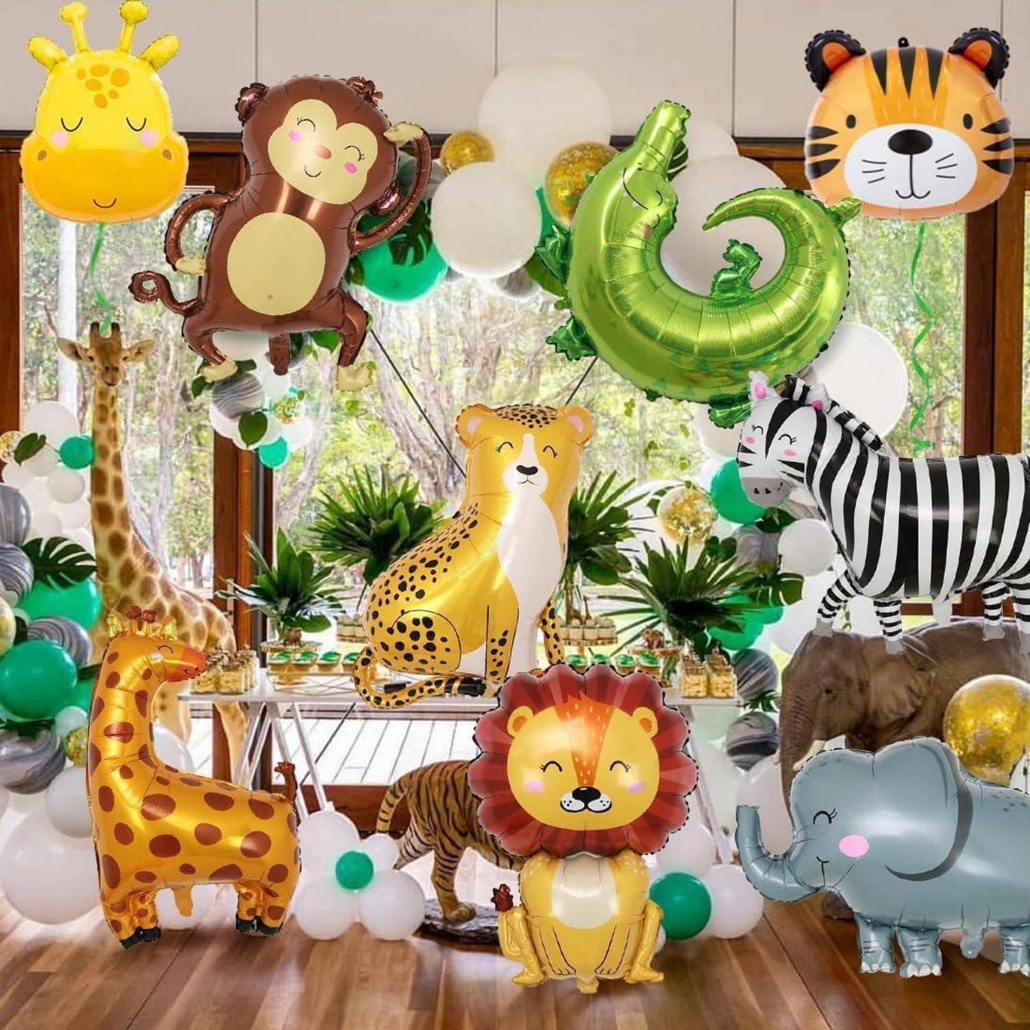 Eine Dschungel-Party-Dekoration mit Tier-Luftballons, darunter ein Affe, Tiger, Zebra, Giraffe und Löwe, umgeben von grünen und weißen Luftballons.
