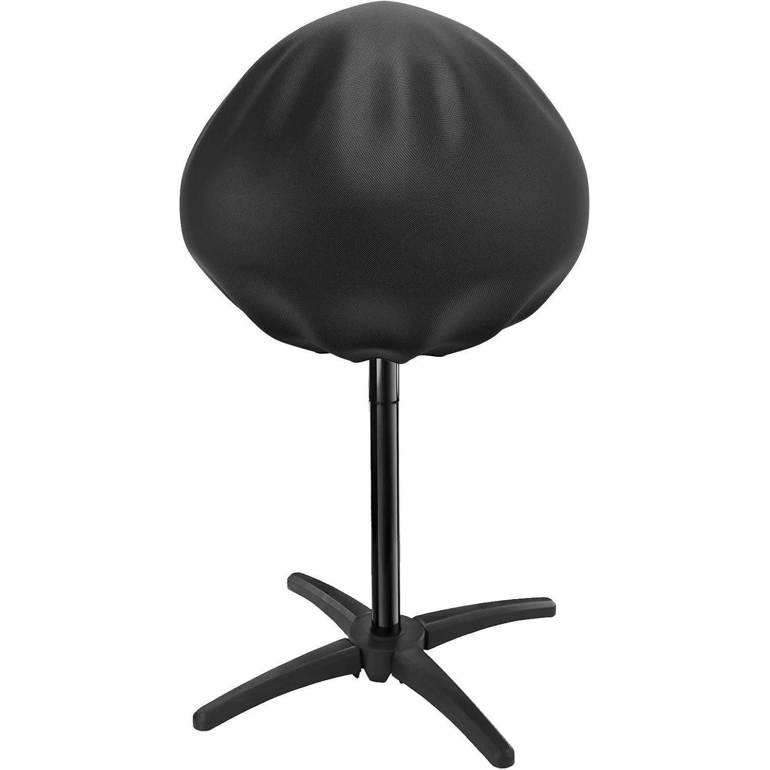 Ein moderner, schwarzer ergonomischer Hocker mit einer runden Sitzfläche auf einer höhenverstellbaren Basis, konzipiert für dynamisches Sitzen in Büroräumen.