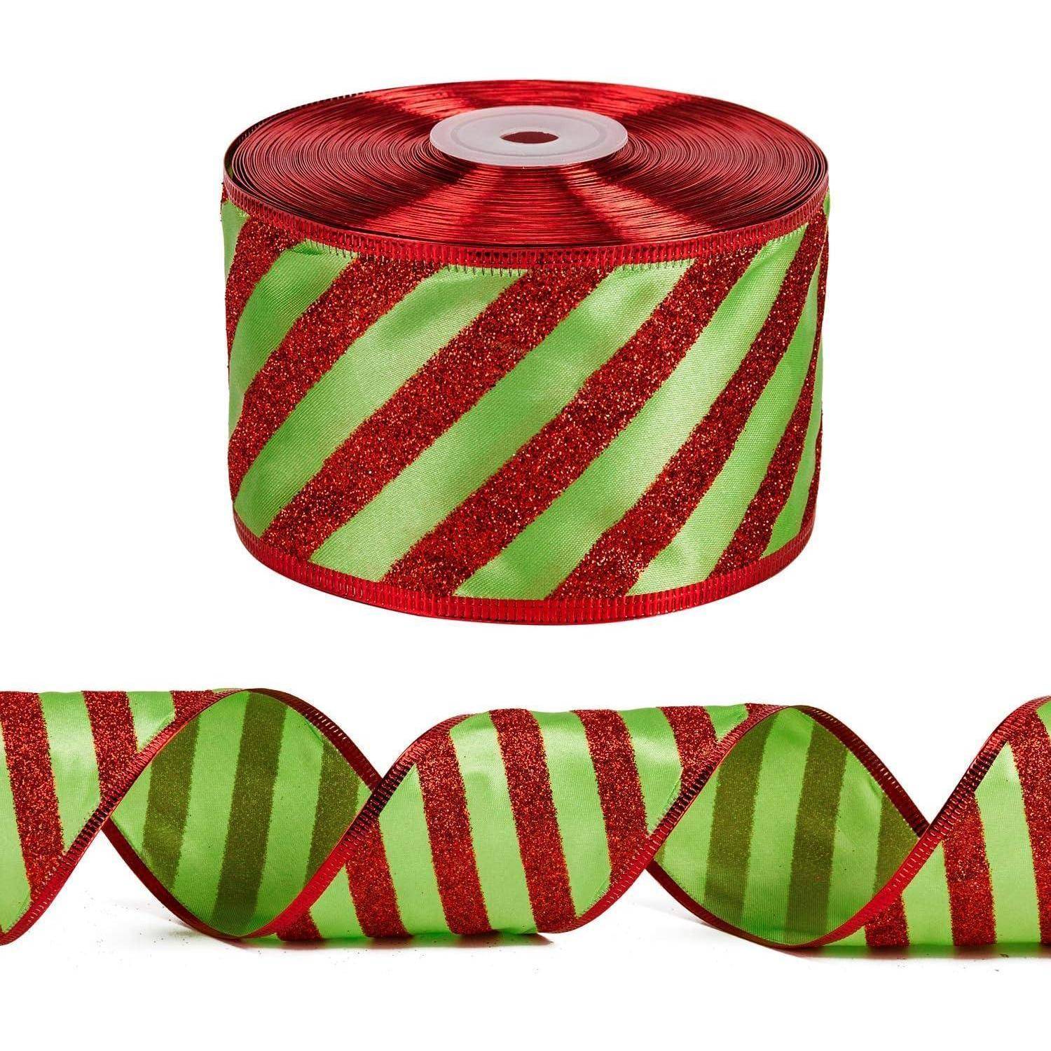 Eine Rolle festlicher Geschenkbänder mit roten glitzernden Diagonalstreifen auf einem hellgrünen Hintergrund, mit einer entrollten Bandlänge darunter.