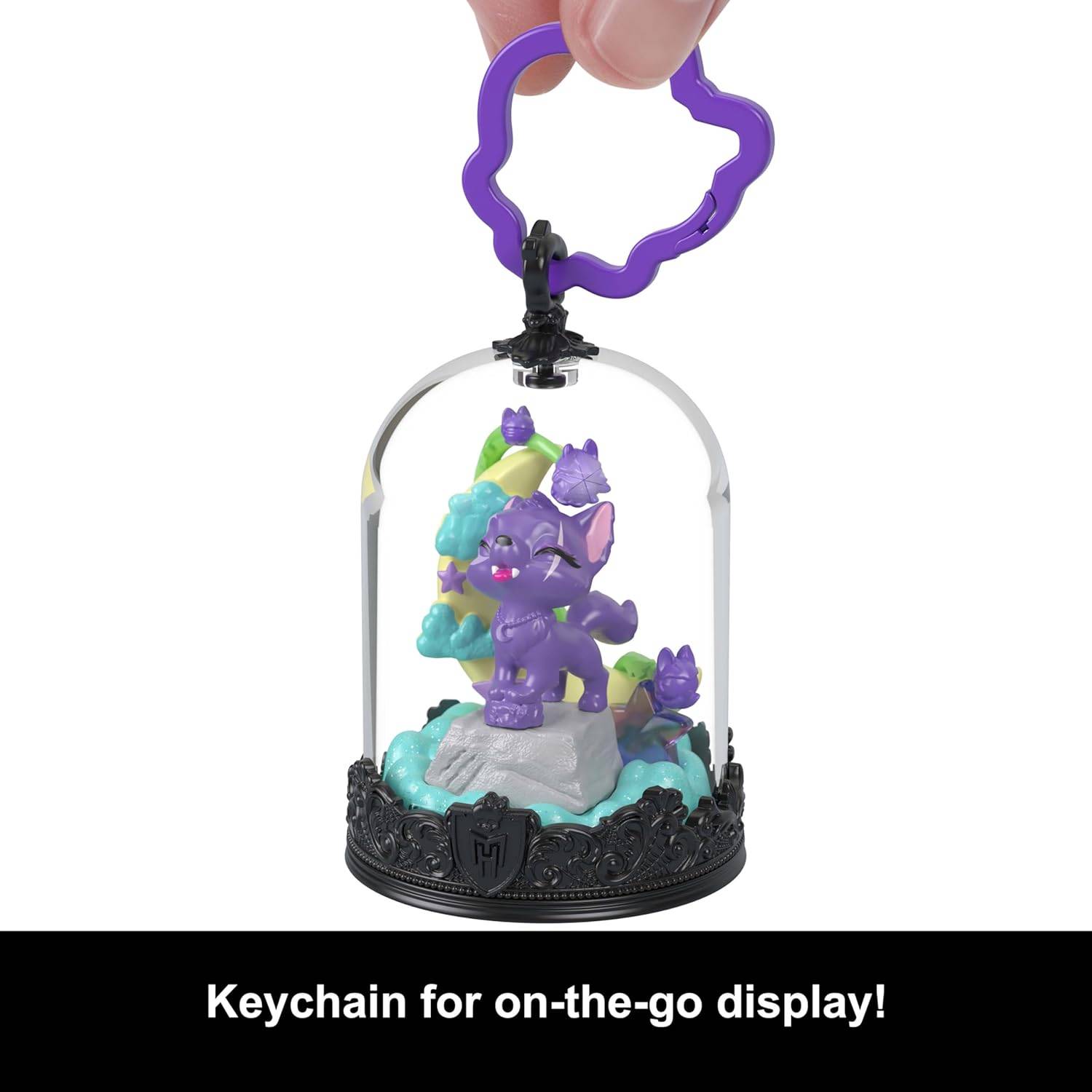 Schlüsselanhänger für unterwegs mit Display!' mit einer farbenfroh gestalteten Figur eines lila Drachen in einer dekorativen Kuppel mit Aufhängehaken.