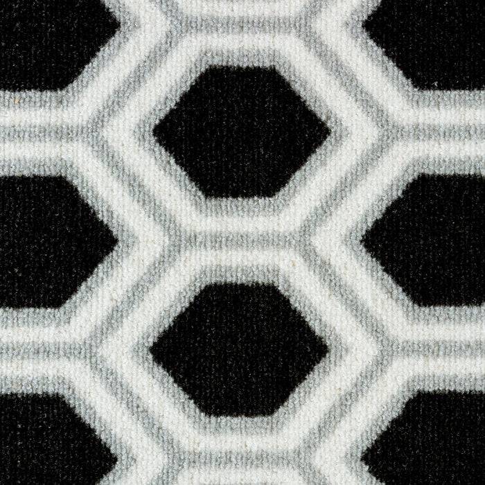 Ein geometrisches Muster aus verschachtelten Sechsecken in Schwarz und Weiß, das ein kontinuierliches, sich wiederholendes Design bildet.