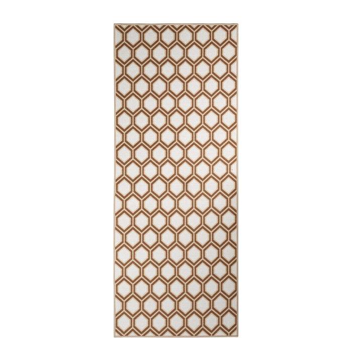 Ein rechteckiger Teppich mit Wabenmustern in Braun und Weiß, der ein sich wiederholendes sechseckiges Design über die gesamte Oberfläche erstreckt.