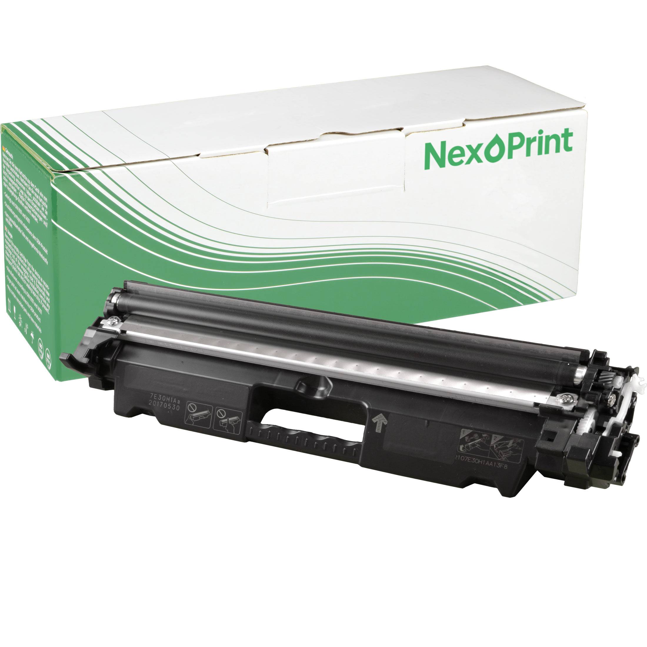 Eine schwarze Tonerpatrone wird vor eine grüne und weiße Box mit der Aufschrift 