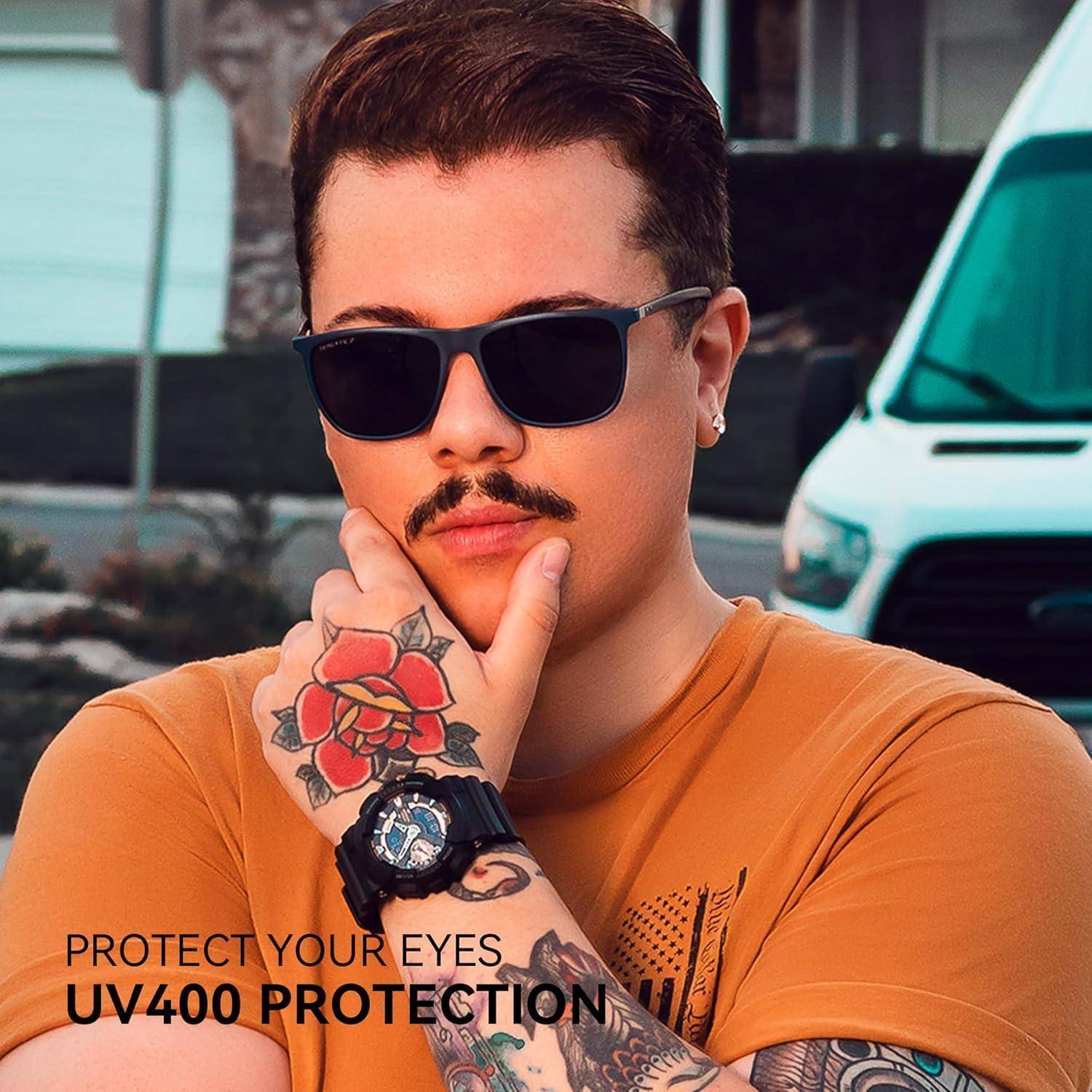 Eine Person mit Sonnenbrille und einer tätowierten Hand, die eine Uhr trägt, posiert draußen neben einem Van. Das Bild wirbt für den 'UV400-Schutz' von Eyewear.