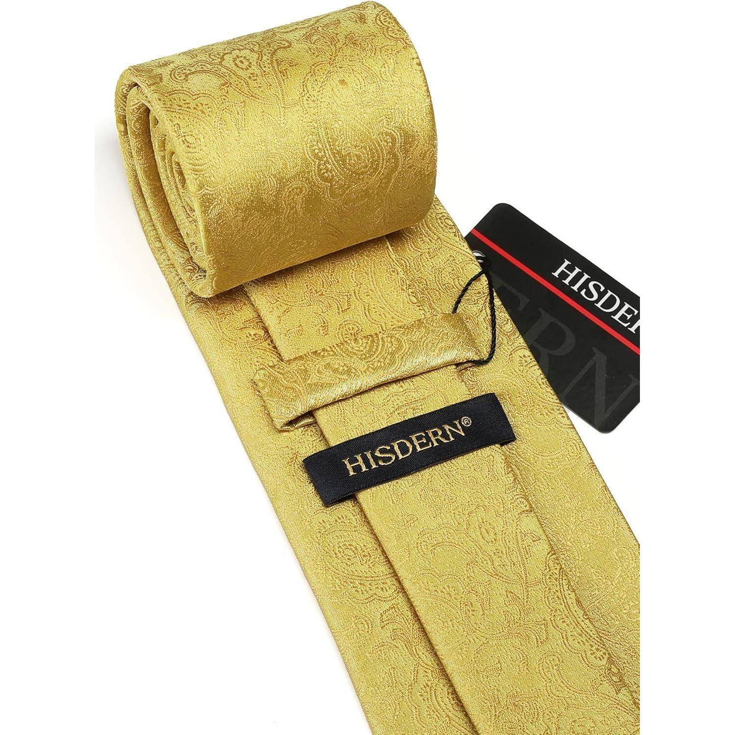 Ein goldener Paisley-Krawattenset mit passendem Einstecktuch, beide mit der Aufschrift 'HISDERN'.