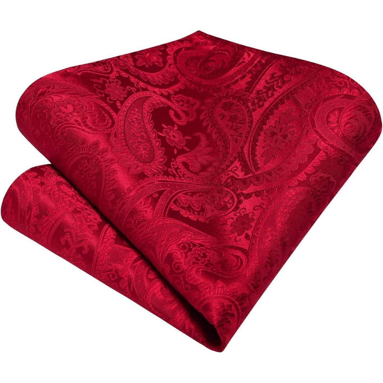 Rotes Paisley-gemustertes Taschentuch, sorgfältig gefaltet, mit kunstvollen floralen und geschwungenen Mustern.