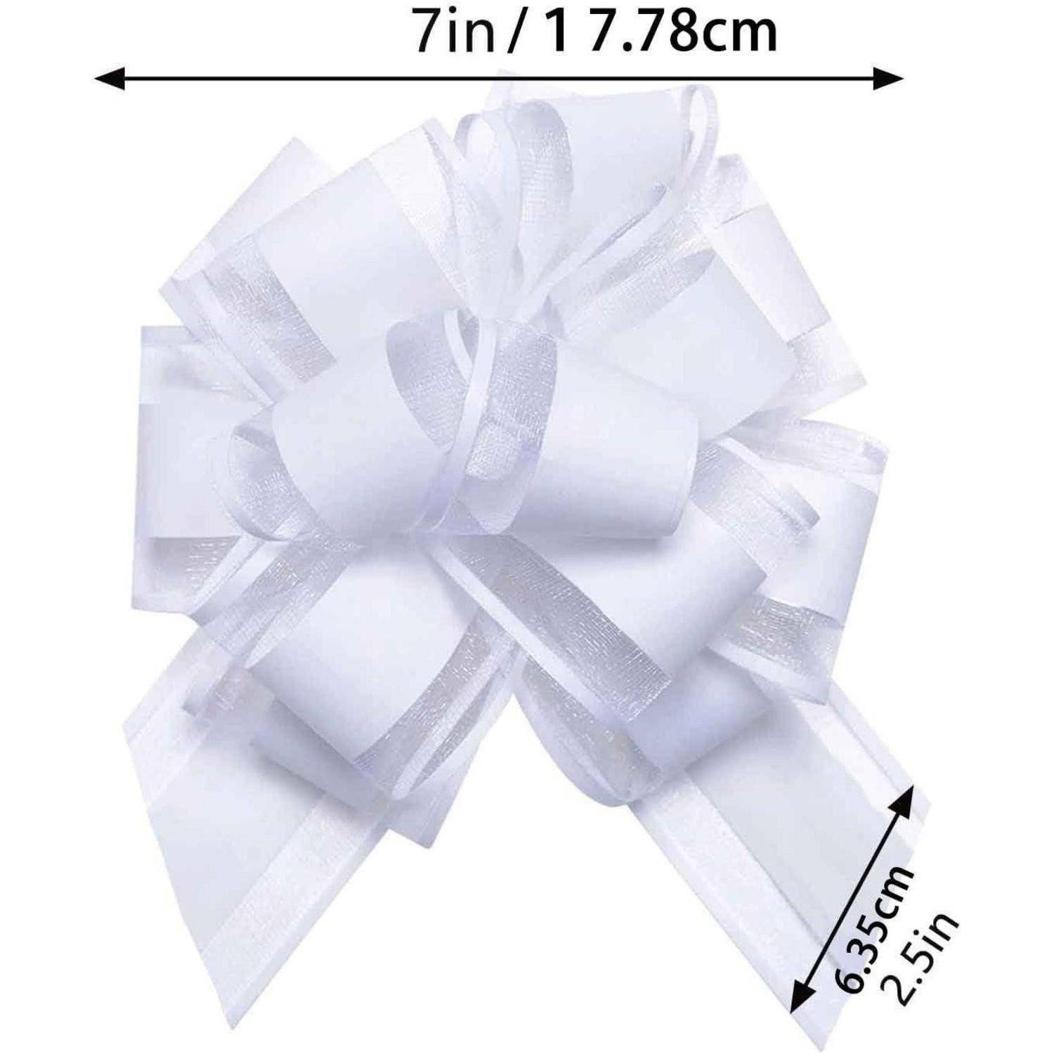 Eine weiße dekorative Schleife mit beschrifteten Abmessungen: Breite 7 Zoll (17,78 cm) und Höhe 2,5 Zoll (6,35 cm).