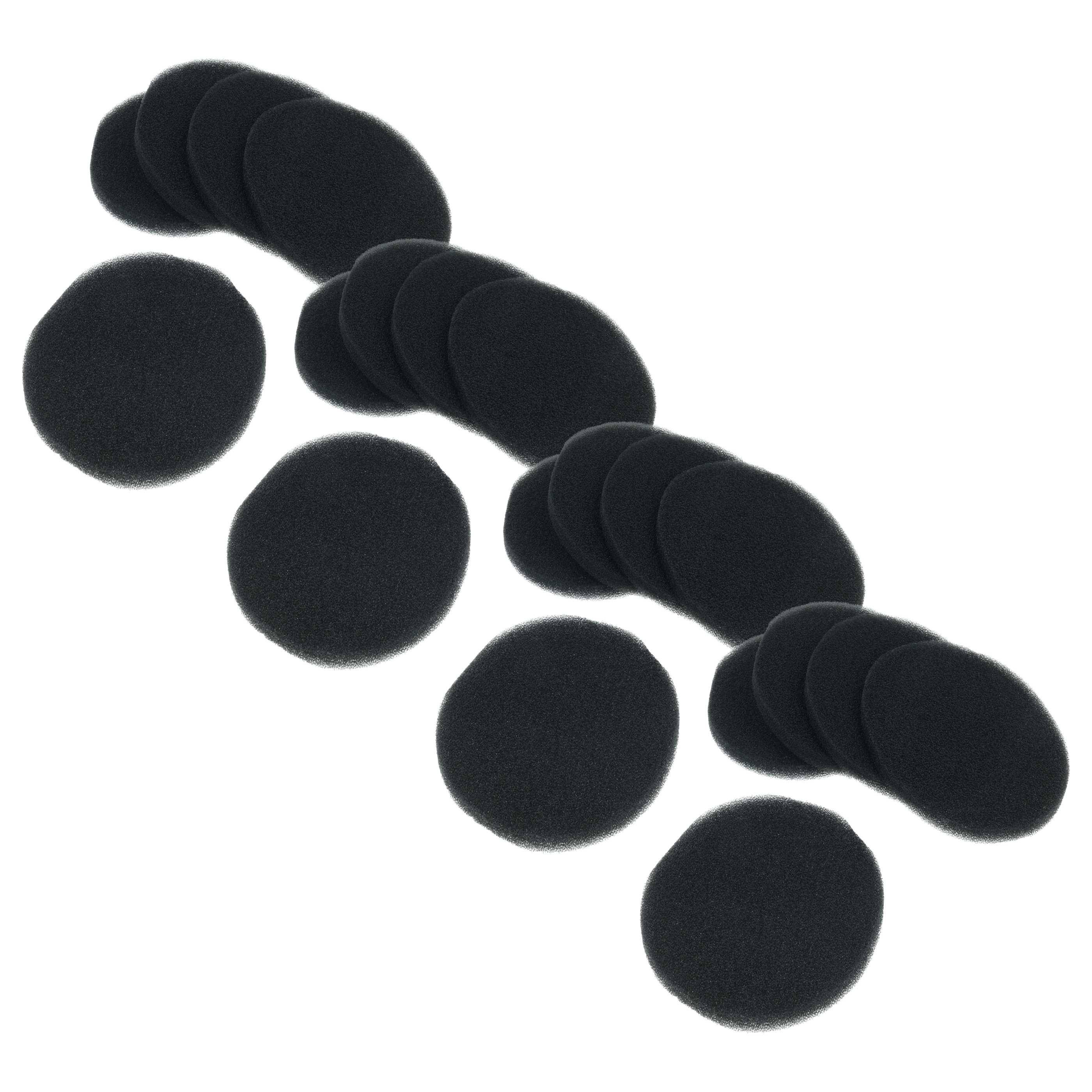 Eine Sammlung schwarzer Schaumstoff-Windschutzabdeckungen für kleine Mikrofone, angeordnet auf einer weißen Oberfläche.
