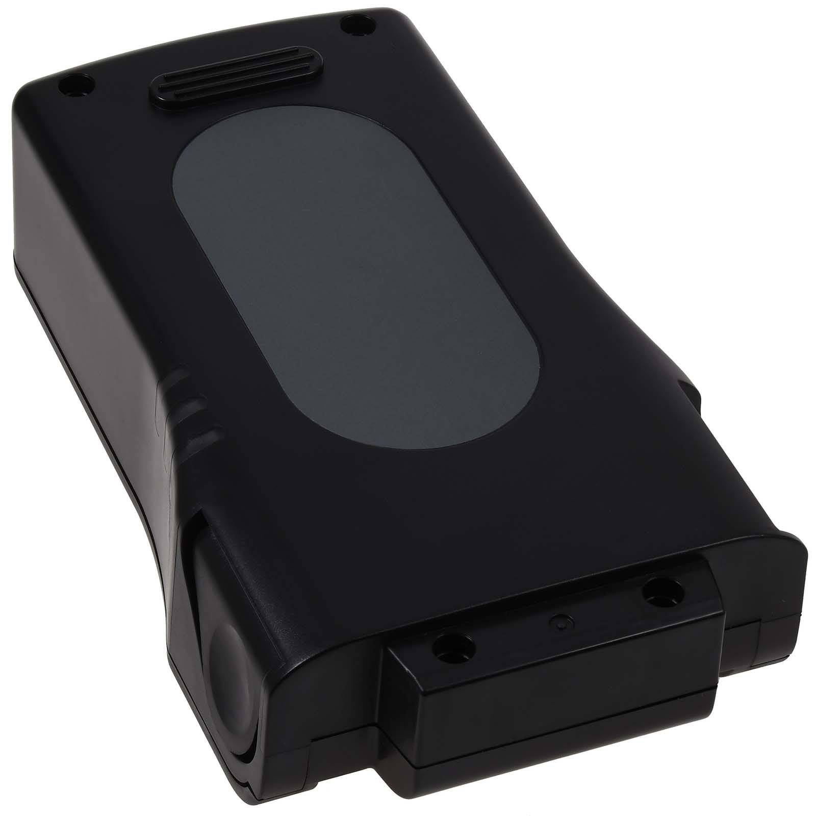 Ein schwarzes, rechteckiges elektronisches Gerät mit abgerundeten Kanten, das eine große graue Fläche auf der Oberseite aufweist, was möglicherweise auf ein Display oder eine Ladestation hindeutet.