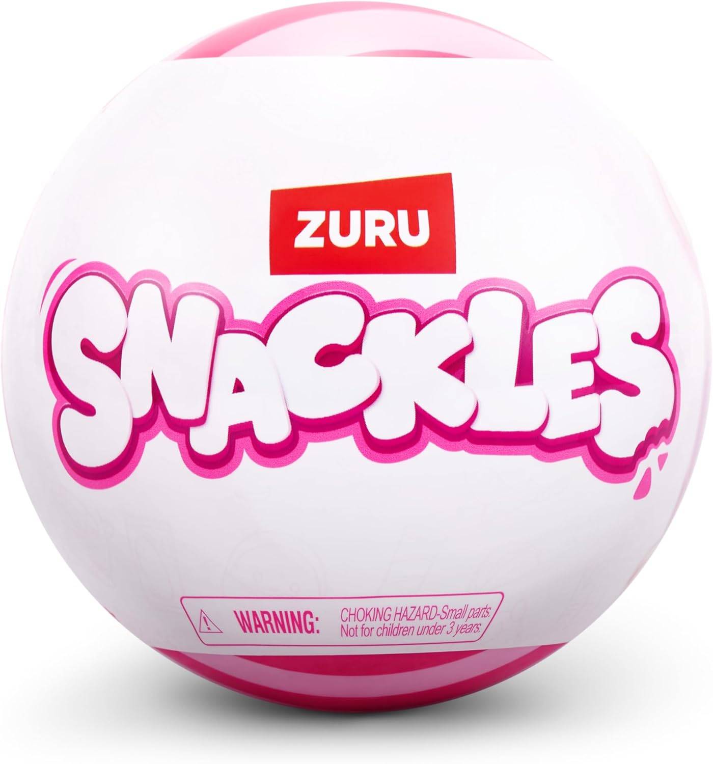 Eine weiße und rosa Kugel mit der Aufschrift 'Zuru Snackles' mit der Warnung: 'Erstickungsgefahr: Kleine Teile. Nicht für Kinder unter 3 Jahren geeignet.
